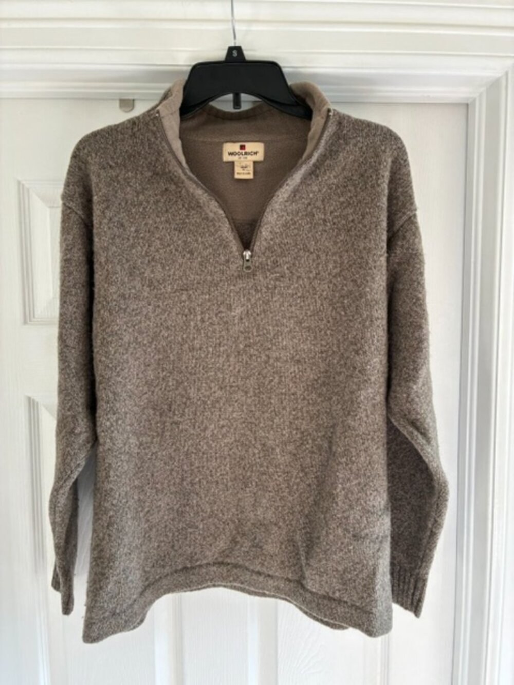 Woolrich 3/4 zip sweater, in fair condition.  size Medium